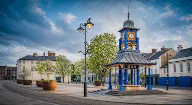 Dunstable town centre clock tower and public square, representing TradeHub Platform helping local tradespeople improve their websites, search visibility and long-term digital growth.