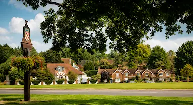 Harpenden village green with traditional homes and tree-lined surroundings, representing TradeHub Platform helping Harpenden trade businesses build trust online through websites, SEO and local visibility.