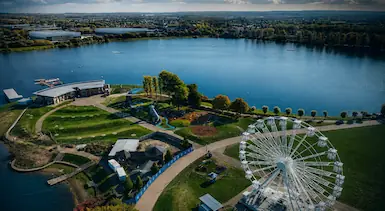 Milton Keynes lakeside leisure area and wider town landscape, representing TradeHub Platform supporting Milton Keynes trade businesses with professional websites, SEO and digital growth systems.