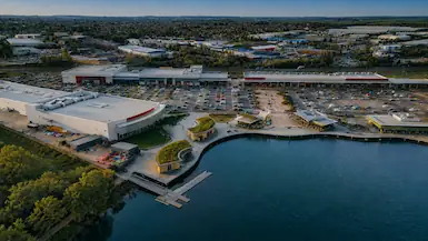 Rushden Lakes shopping and leisure area viewed from above, representing TradeHub Platform helping Rushden trade businesses grow online through stronger websites, local SEO and digital visibility.